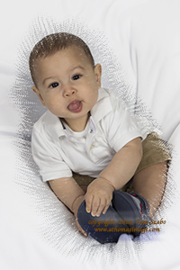 Photography - infant holding his sandal