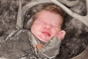 Infant in camo.